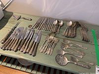 All pieces laid out on table showing full lot.