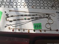 Overview of all six pieces on white surface under natural light