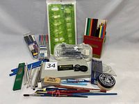 Full lot showing all drafting equipment including pens, pencils, brushes, rulers, easers, and loupe