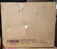 Cardboard box of the stools showing shipping label and dimensions