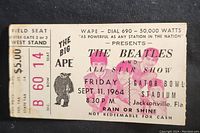 Front of ticket stub showing event details and printed graphics