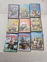 First photo showing nine DreamWorks children animation DVDs including Shrek, How to Train Your Dragon, Madagascar and Kung Fu Panda.