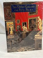 Front cover of one volume in sealed packaging, showing museum interior with paintings and sculptures on red walls.