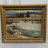 Full view of framed painting showing creek ice-hockey scene