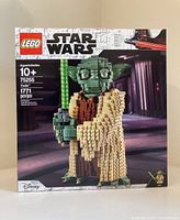 Front view of sealed box showing LEGO Star Wars branding, set number 75255, piece count 1771 and Yoda model image