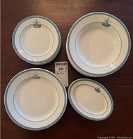 Overview of four representative pieces showing bowl, lunch plate, bread and butter plate, and oval side dish.