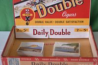Photo showing original Daily Double Cigars cardboard box with cards inside