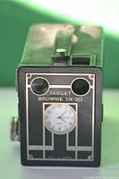 Front view of the Target Brownie Six-20 camera showing the clock conversion in place of the camera lens.