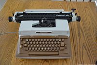 Top view of the Smith Corona Coronomatic 8000 typewriter showing the platen and keyboard.