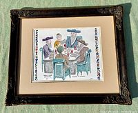 Framed artwork showing entire piece including ornate dark wood frame and beige matting.