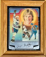Full front view of the framed Wayne Gretzky Edmonton Oilers mylar mirror showing the entire artwork and wooden frame.