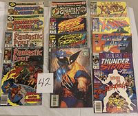 Image showing various Marvel comics front covers including Fantastic Four, Spirits of Venom, Classic X-Men, Ghost Rider, and more.