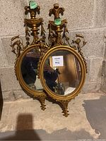 Front view of both mirrors side by side on floor