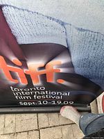 TIFF poster with event dates Sept. 10-19, 2009 in orange and white text on dark background.