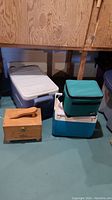 Three coolers and vintage shoeshine kit, wooden box with handle and 3 coolers