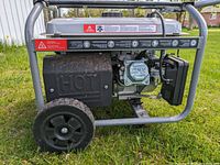 Side view showing engine housing, frame and wheel condition