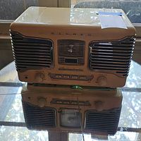 Full front view of the beige TEAC SL-D80 retro radio CD player showing chrome speaker grills, power and tuning controls, and radio dial.