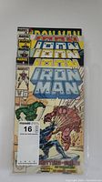 Front covers of 6 Iron Man comic books stacked showing Marvel branding and Iron Man title logos.