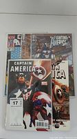 Photo of five Captain America books showing covers and lot composition