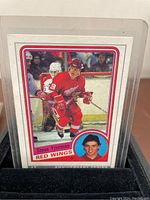 Front of Steve Yzerman 1992 Topps Anniversary hockey card showing player in action and profile image.