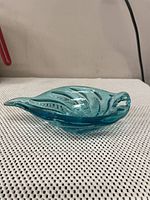 Side view showing the bowl's shape, color, and smooth finish.