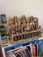 Overall front view of multi-figure ceramic Last Supper sculpture