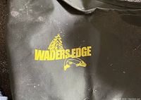 Close-up photo of Waders Edge logo on the hip waders.
