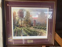 Overall view of framed print showing mat, frame, and plaque