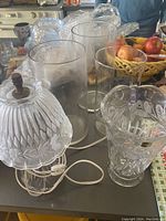 Photo showing Princess House lamp with frosted cut glass floral shade, modern glass vases, and crystal vase
