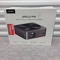 Boxed Ultimea Apollo P40 Auto Focus 1080P projector packaging showing model and features