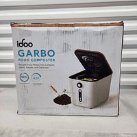 Product box showing branding, model name and product image