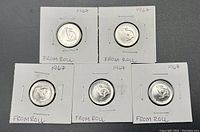 Five 1967 Canadian nickels in individual holders, front view showing bunny rabbit design, arranged in two rows