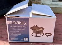 Box of the For Living Portable Gas Fire Bowl showing brand and model info