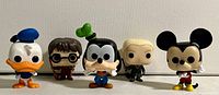 Funko Pocket Pops featuring Donald Duck, Harry Potter, Goofy, and Mickey Mouse characters