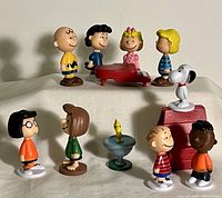 Full group of Peanuts character figures arranged in scene