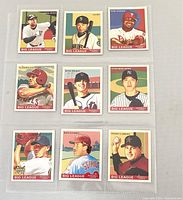 Front side of the 9 2007 Goudey Big League baseball cards featuring players such as Derek Jeter, Ichiro, Ryan Howard, Vladimir Guerrero, David Wright, Chien-Ming Wang, Mike Schmidt, and Roger Clemens, displayed in protective plastic sleeve.