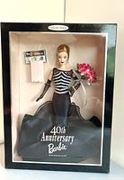 Full view of Barbie doll in original box with 40th Anniversary labeling and black packaging
