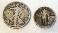 Photo of both coins showing obverse sides: left is the 1943 Walking Liberty half dollar and right is the standing Liberty quarter with visible wear and silver patina.
