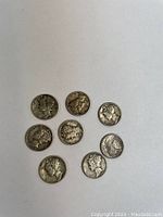 Top side (obverse) of 8 Liberty Mercury Head dimes