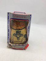 Vintage wooden wobble doll in original Stanka box with visible wear and tears on the packaging.