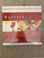 Photo showing Hahnemuhle Quattro Watercolour paper pad with floral design on cover, 140 lbs, 300 gsm paper