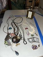 Group shot of jewelry assortment laid on table