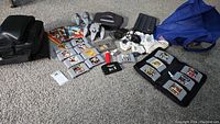 Overview of console, controllers, game cartridges and carrying cases