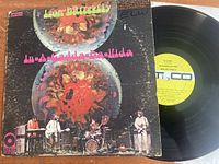 Front cover and vinyl of Iron Butterfly In-A-Gadda-Da-Vida album showing condition of sleeve and record surface.