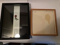 Three shadow frames viewed from front and back on a white surface, showing one black frame with rose matting and two frames with plain backing, one wood and one black with corner damage.