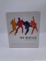 Front of the boxed set showing colorful silhouettes of The Beatles and title 'It was 50 years ago today'.