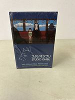 Boxed set of Studio Ghibli postcards, showing Totoro and No-Face characters on the front, sealed in plastic wrap.