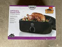 Front of box showing Rival Self-Basting Roaster Oven with 16 quart capacity, image of roasted turkey on the roaster, and product features.