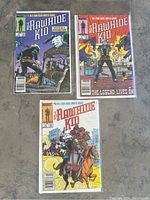 Three Marvel Rawhide Kid comics laid out in protective bags showing front covers