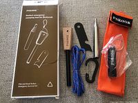 Photo of all components laid out with the box showing the product branding and tool illustrations